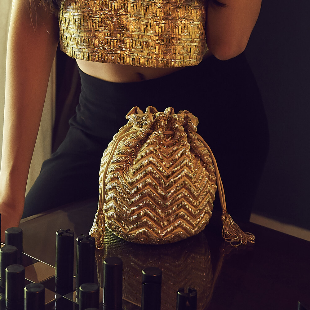 Zena Potli Peerless Gold Lustrous Silver